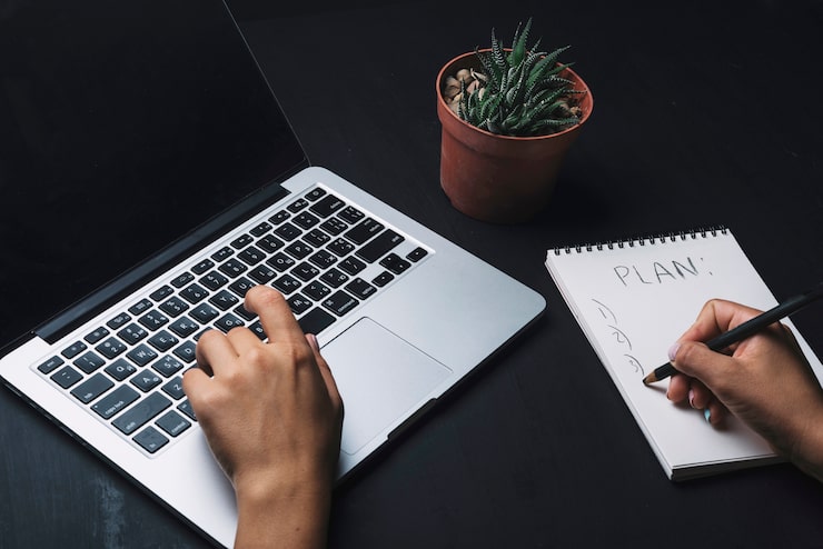 Freelance copywriter working remotely on laptop from home USA