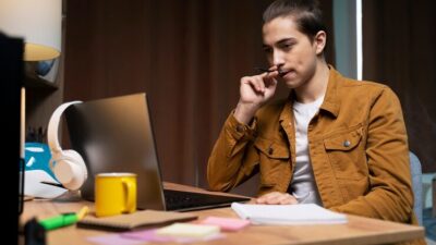 Freelance copywriter working remotely on laptop from home USA